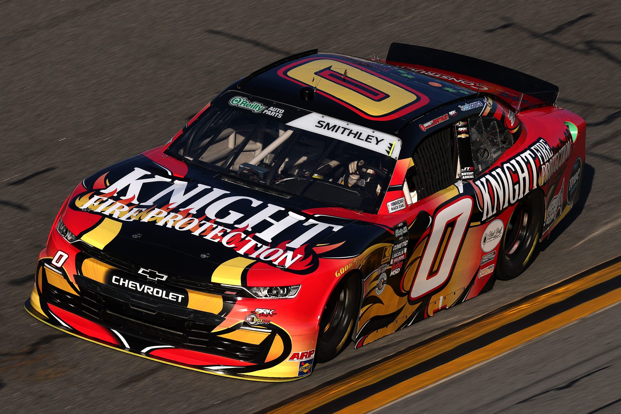 DAYTONA BEACH, FLORIDA - FEBRUARY 13: Garrett Smithley, driver of the #0 Knight Fire Protection Chevrolet, drives during practice for the NASCAR O'Reilly Auto Parts Series United Rentals 300 at Daytona International Speedway on February 13, 2026 in Daytona Beach, Florida. (Photo by Chris Graythen/Getty Images) | Getty Images