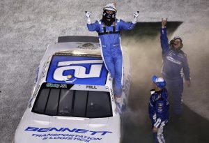 DAYTONA BEACH, FLORIDA - FEBRUARY 14: Austin Hill, driver of the #21 Bennett Transportation Chevrolet, celebrates after winning the NASCAR O'Reilly Auto Parts Series United Rentals 300 at Daytona International Speedway on February 14, 2026 in Daytona Beach, Florida. (Photo by Sean Gardner/Getty Images) | Getty Images