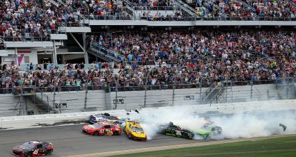 DAYTONA BEACH, FLORIDA - FEBRUARY 15: Tyler Reddick, driver of the #45 Chumba Casino Toyota, leads the field to win as Joey Logano, driver of the #22 Shell Pennzoil Ford, Chase Elliott, driver of the #9 NAPA Auto Parts Chevrolet, and Riley Herbst, driver of the #35 Monster Energy Zero Sugar Toyota, spin after an on-track incident to end the NASCAR Cup Series Daytona 500 at Daytona International Speedway on February 15, 2026 in Daytona Beach, Florida. (Photo by Chris Graythen/Getty Images) | Getty Images