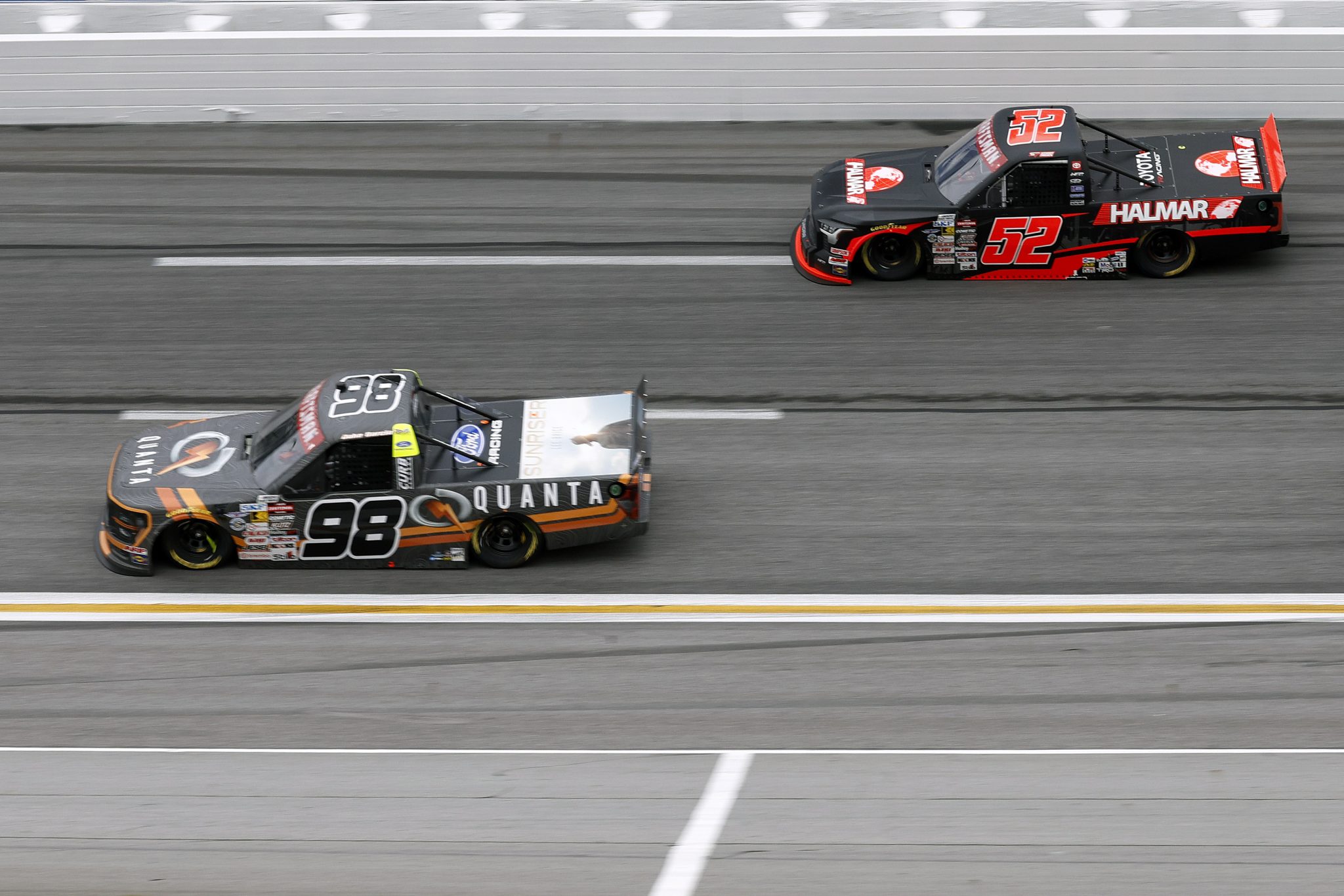 HAMPTON, GEORGIA - FEBRUARY 21: Stewart Friesen, driver of the #52 Halmar International Toyota, and Jake Garcia, driver of the #98 Quanta Services/Curb Records Ford, race during the NASCAR Craftsman Truck Series Fr8 Racing 208 at Echo Park Speedway on February 21, 2026 in Hampton, Georgia. (Photo by Sean Gardner/Getty Images) | Getty Images