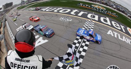 HAMPTON, GEORGIA - FEBRUARY 21: Kyle Busch, driver of the #7 HendrickCars.com Chevrolet, takes the checkered flag to win the NASCAR Craftsman Truck Series Fr8 Racing 208 at Echo Park Speedway on February 21, 2026 in Hampton, Georgia. (Photo by Jonathan Bachman/Getty Images) | Getty Images