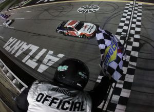HAMPTON, GEORGIA - FEBRUARY 21: Sheldon Creed, driver of the #00 Road Ranger Chevrolet, takes the checkered flag to win the NASCAR O'Reilly Auto Parts Series Bennett Transportation & Logistics 250 at Echo Park Speedway on February 21, 2026 in Hampton, Georgia. (Photo by Jonathan Bachman/Getty Images) | Getty Images