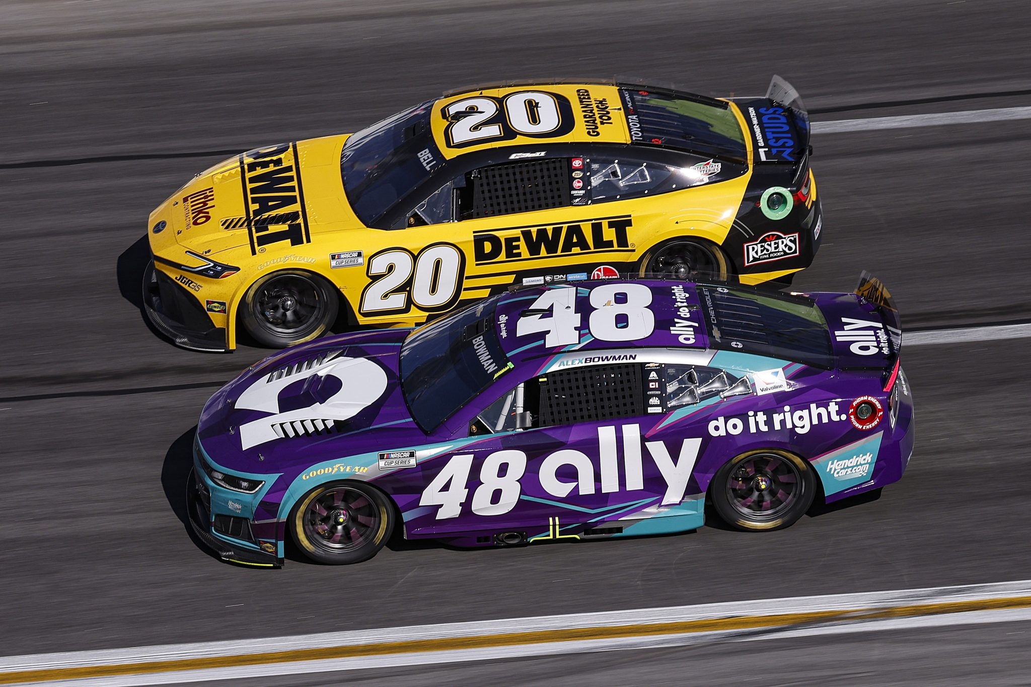 HAMPTON, GEORGIA - FEBRUARY 22: Alex Bowman, driver of the #48 Ally Chevrolet, and Christopher Bell, driver of the #20 DEWALT Toyota, race during the NASCAR Cup Series Autotrader 400 at Echo Park Speedway on February 22, 2026 in Hampton, Georgia. (Photo by Sean Gardner/Getty Images) | Getty Images
