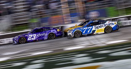 HAMPTON, GEORGIA - FEBRUARY 22: Bubba Wallace, driver of the #23 Xfinity Toyota, Christopher Bell, driver of the #20 DEWALT Toyota, and Carson Hocevar, driver of the #77 Spectrum Chevrolet, race during the NASCAR Cup Series Autotrader 400 at Echo Park Speedway on February 22, 2026 in Hampton, Georgia. (Photo by Sean Gardner/Getty Images) | Getty Images