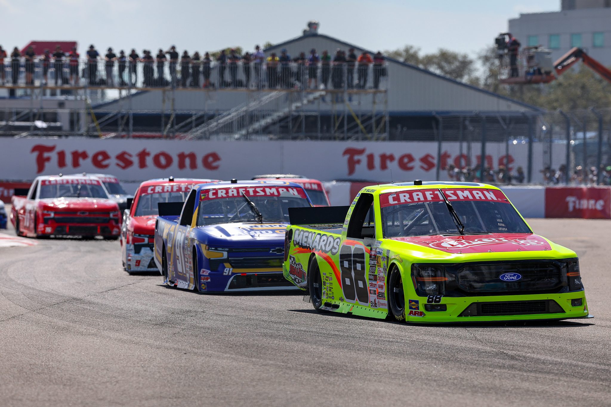 ST PETERSBURG, FLORIDA - FEBRUARY 28: Ty Majeski, driver of the #88 Chi Chis/Menards Ford, and Christian Eckes, driver of the #91 NAPA Auto Care Chevrolet, race during the NASCAR Craftsman Truck Series OnlyBulls Green Flag 150 at Grand Prix of St. Petersburg on February 28, 2026 in St Petersburg, Florida. (Photo by David Jensen/Getty Images) | Getty Images