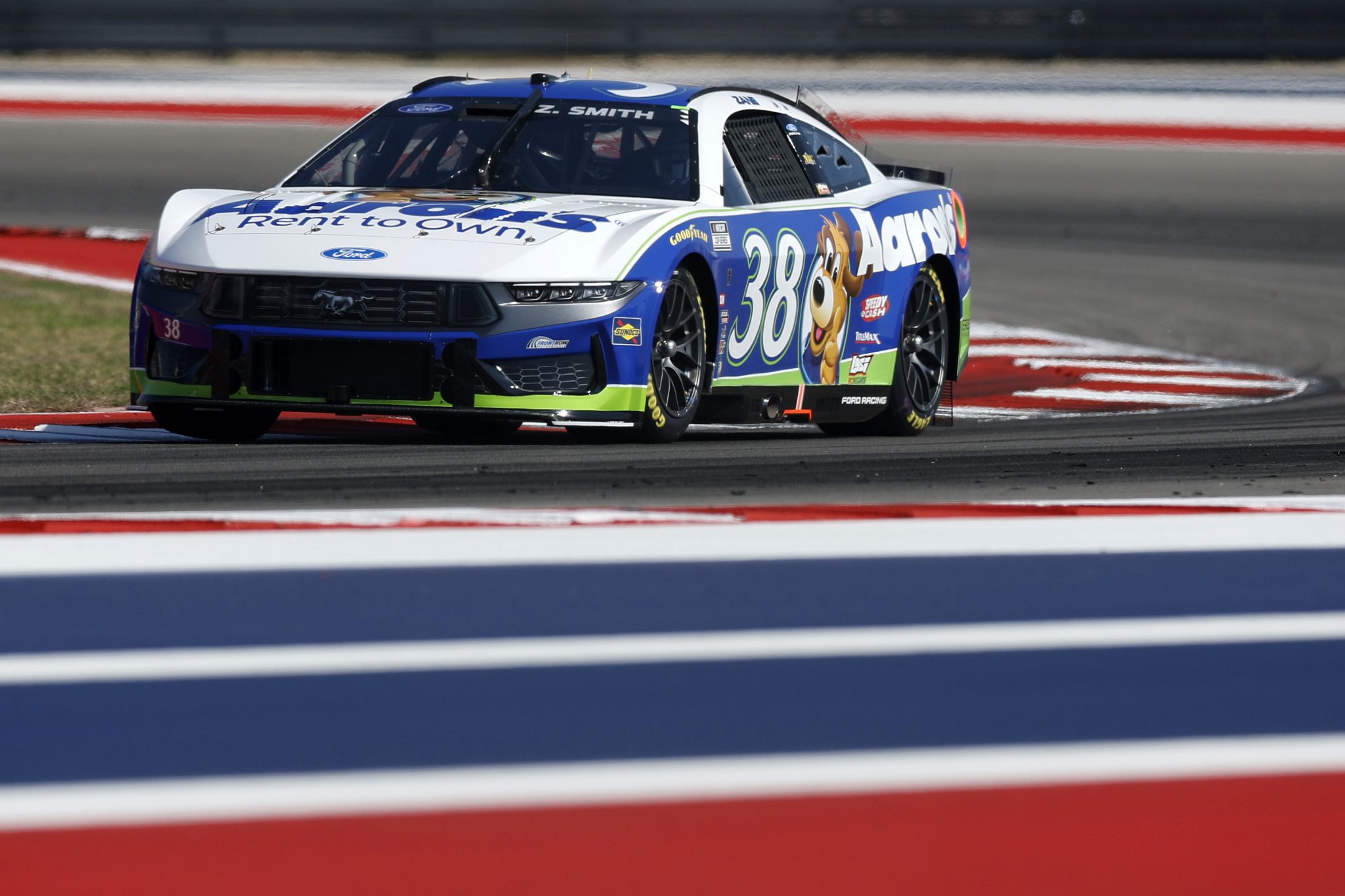 AUSTIN, TEXAS - FEBRUARY 28: Zane Smith, driver of the #38 Aaron's Rent To Own Ford, drives during qualifying for the NASCAR Cup Series DuraMax Grand Prix Powered by RelaDyne at Circuit of The Americas on February 28, 2026 in Austin, Texas. (Photo by Logan Riely/Getty Images) | Getty Images