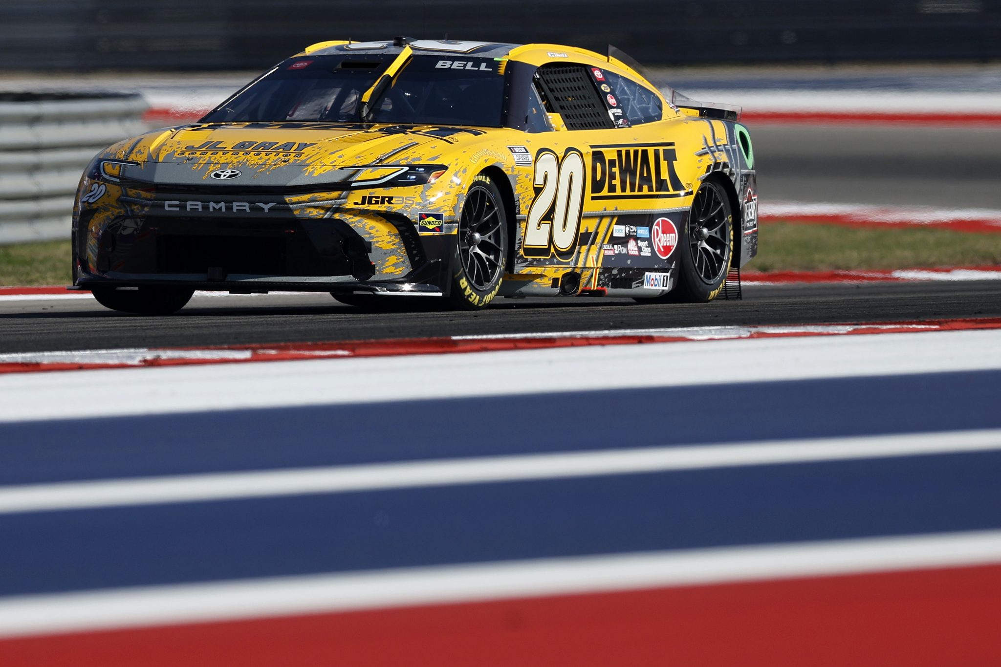 AUSTIN, TEXAS - FEBRUARY 28: Christopher Bell, driver of the #20 DEWALT Toyota, drives during qualifying for the NASCAR Cup Series DuraMax Grand Prix Powered by RelaDyne at Circuit of The Americas on February 28, 2026 in Austin, Texas. (Photo by Logan Riely/Getty Images) | Getty Images