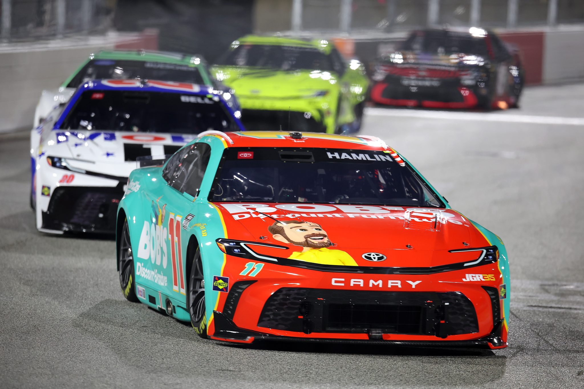 WINSTON SALEM, NORTH CAROLINA - FEBRUARY 04: Denny Hamlin, driver of the #11 Bob's Discount Furniture Toyota, drives during the Cook Out Clash at Bowman Gray Stadium at Bowman Gray Stadium on February 04, 2026 in Winston Salem, North Carolina. (Photo by Jonathan Bachman/Getty Images) | Getty Images