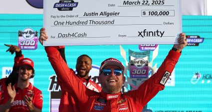 HOMESTEAD, FLORIDA - MARCH 22: Justin Allgaier, driver of the #7 BRANDT/TradeMark Nitrogen Chevrolet, celebrates with the 100,000 check in victory lane after winning the NASCAR Xfinity Series Hard Rock Bet 300 at Homestead-Miami Speedway on March 22, 2025 in Homestead, Florida. (Photo by James Gilbert/Getty Images) | Getty Images