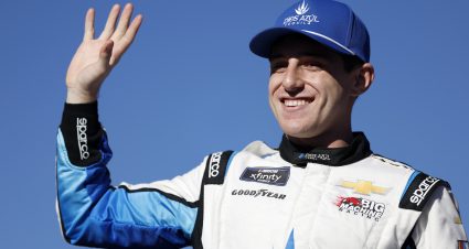 LAS VEGAS, NEVADA - OCTOBER 11: Nick Sanchez, driver of the #48 DIOS AZUL Tequila Chevrolet, waves to fans as he walks onstage during driver intros prior to the NASCAR Xfinity SeriesFocused Health 302 at Las Vegas Motor Speedway on October 11, 2025 in Las Vegas, Nevada. (Photo by Logan Riely/Getty Images) | Getty Images