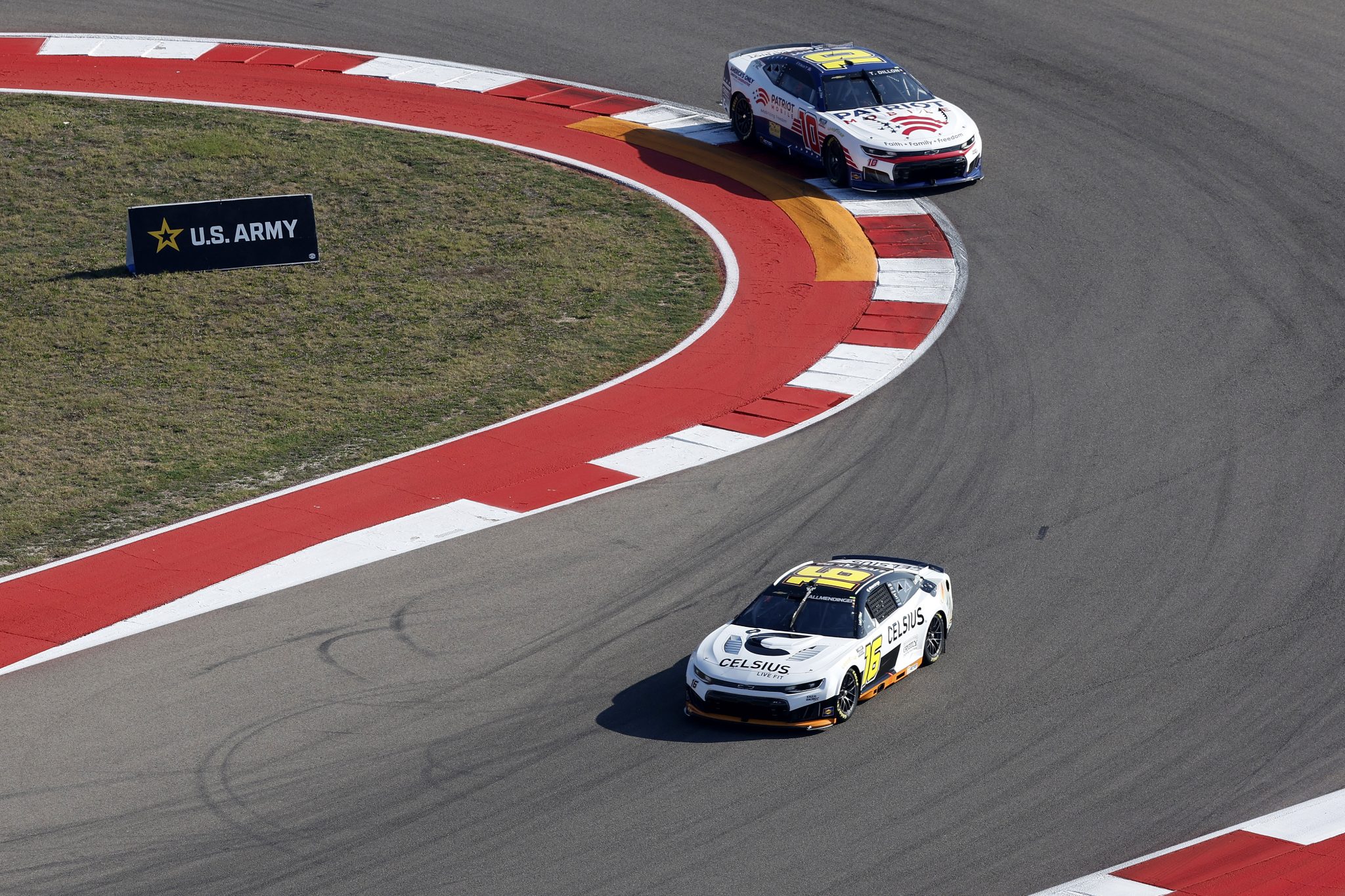 AUSTIN, TEXAS - FEBRUARY 28: AJ Allmendinger, driver of the #16 Celsius Chevrolet, and Ty Dillon, driver of the #10 Patriot Mobile Chevrolet, drive during qualifying for the NASCAR Cup Series DuraMax Grand Prix Powered by RelaDyne at Circuit of The Americas on February 28, 2026 in Austin, Texas. (Photo by Logan Riely/Getty Images) | Getty Images