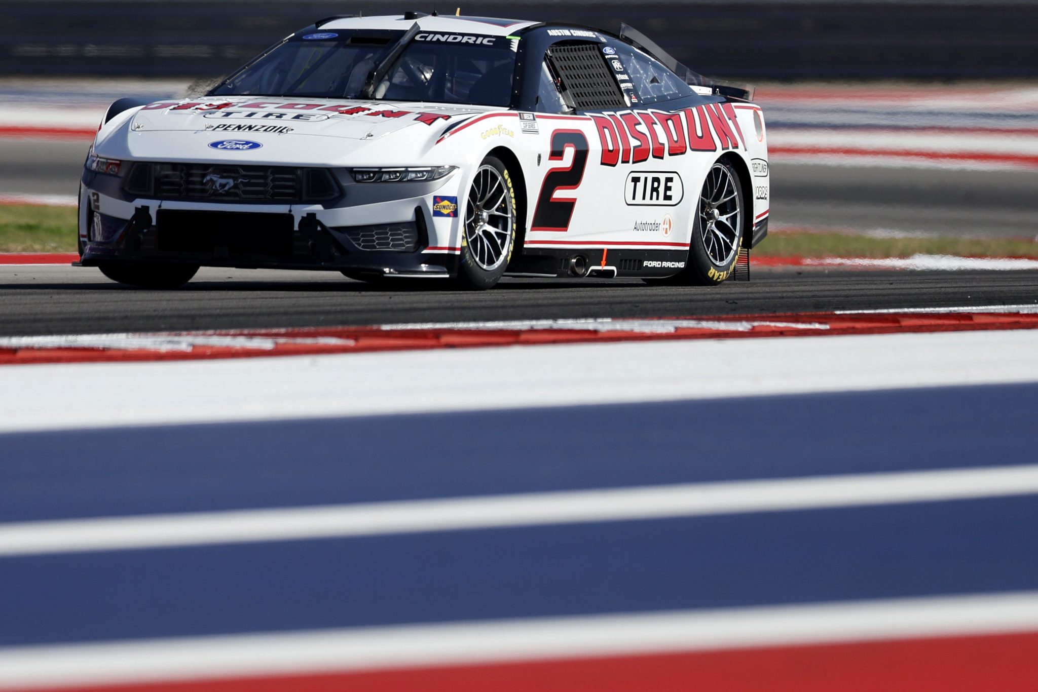 AUSTIN, TEXAS - FEBRUARY 28: Austin Cindric, driver of the #2 Discount Tire Ford, drives during qualifying for the NASCAR Cup Series DuraMax Grand Prix Powered by RelaDyne at Circuit of The Americas on February 28, 2026 in Austin, Texas. (Photo by Logan Riely/Getty Images) | Getty Images