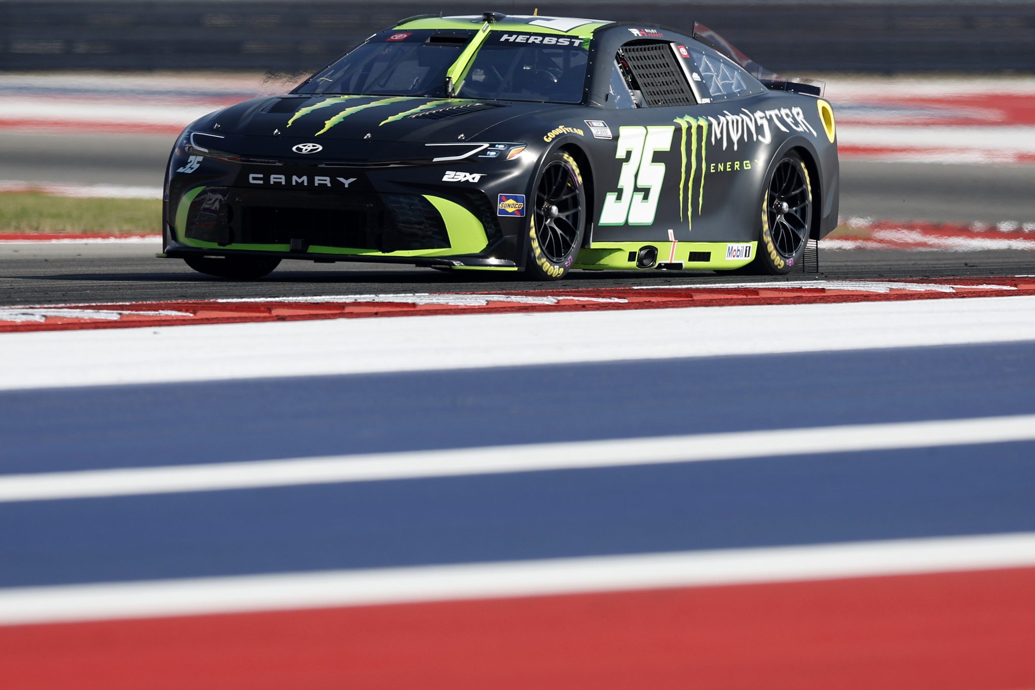 AUSTIN, TEXAS - FEBRUARY 28: Riley Herbst, driver of the #35 Monster Energy Toyota, drives during qualifying for the NASCAR Cup Series DuraMax Grand Prix Powered by RelaDyne at Circuit of The Americas on February 28, 2026 in Austin, Texas. (Photo by Logan Riely/Getty Images) | Getty Images