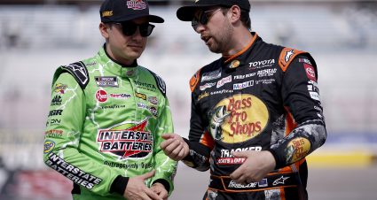 LAS VEGAS, NEVADA - MARCH 14: Christopher Bell, driver of the #20 Interstate Batteries Toyota, (L) and Chase Briscoe, driver of the #19 Bass Pro Shops Toyota, talk on the grid during practice for the NASCAR Cup Series Pennzoil 400 presented by Jiffy Lube at Las Vegas Motor Speedway on March 14, 2026 in Las Vegas, Nevada. (Photo by Sean Gardner/Getty Images) | Getty Images