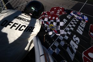 LAS VEGAS, NEVADA - MARCH 14: Kyle Larson, driver of the #88 HendrickCars.com Chevrolet, takes the checkered flag to win the NASCAR O'Reilly Auto Parts Series The LiUNA! at Las Vegas Motor Speedway on March 14, 2026 in Las Vegas, Nevada. (Photo by Chris Graythen/Getty Images) | Getty Images