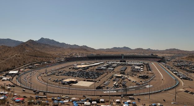 AVONDALE, ARIZONA - MARCH 09: A general view of racing and Goodyear blimp from the hillside area during the NASCAR Cup Series Shriners Children's 500 at Phoenix Raceway on March 09, 2025 in Avondale, Arizona. (Photo by Jonathan Bachman/Getty Images) | Getty Images