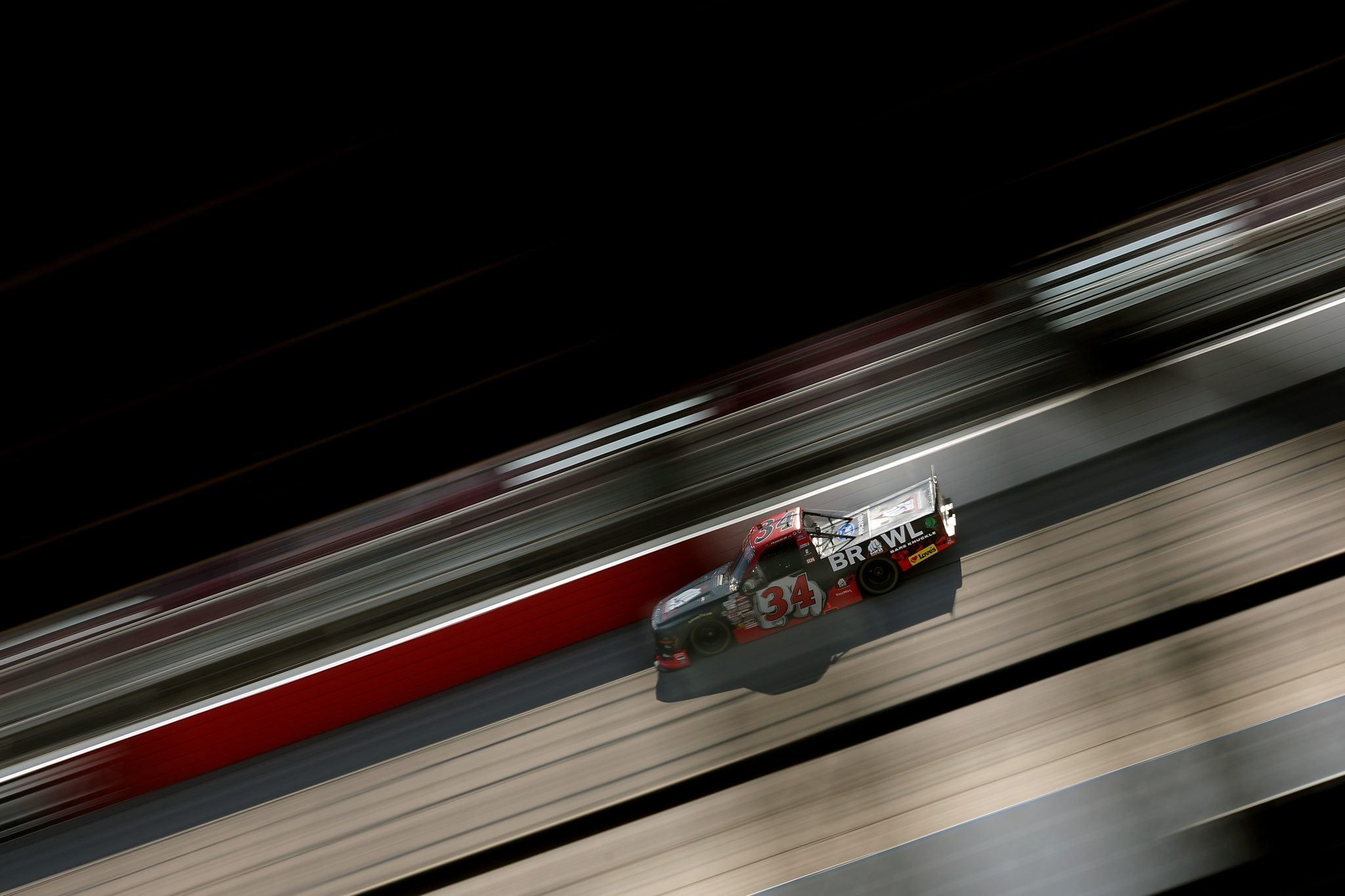 DARLINGTON, SOUTH CAROLINA - MARCH 20: Layne Riggs, driver of the #34 BKB Bare Knuckle Boxing Ford, drives during practice for the NASCAR Craftsman Truck Series Buckle Up South Carolina 200 at Darlington Raceway on March 20, 2026 in Darlington, South Carolina. (Photo by Jonathan Bachman/Getty Images) | Getty Images