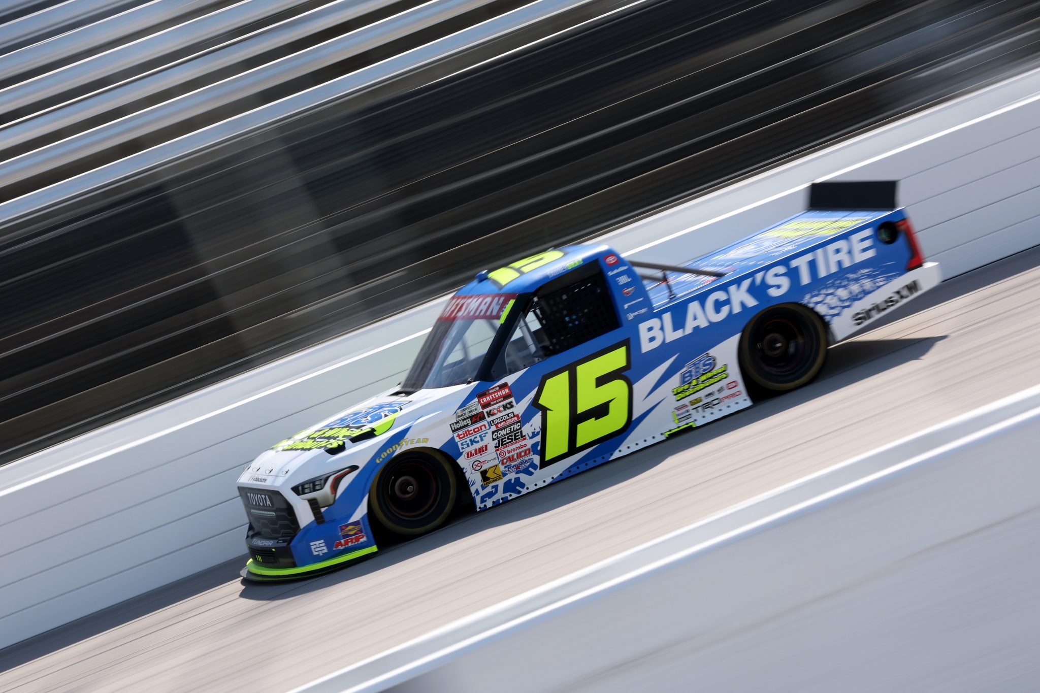 DARLINGTON, SOUTH CAROLINA - MARCH 20: Tanner Gray, driver of the #15 Black's Tire Toyota, drives during practice for the NASCAR Craftsman Truck Series Buckle Up South Carolina 200 at Darlington Raceway on March 20, 2026 in Darlington, South Carolina. (Photo by David Jensen/Getty Images) | Getty Images