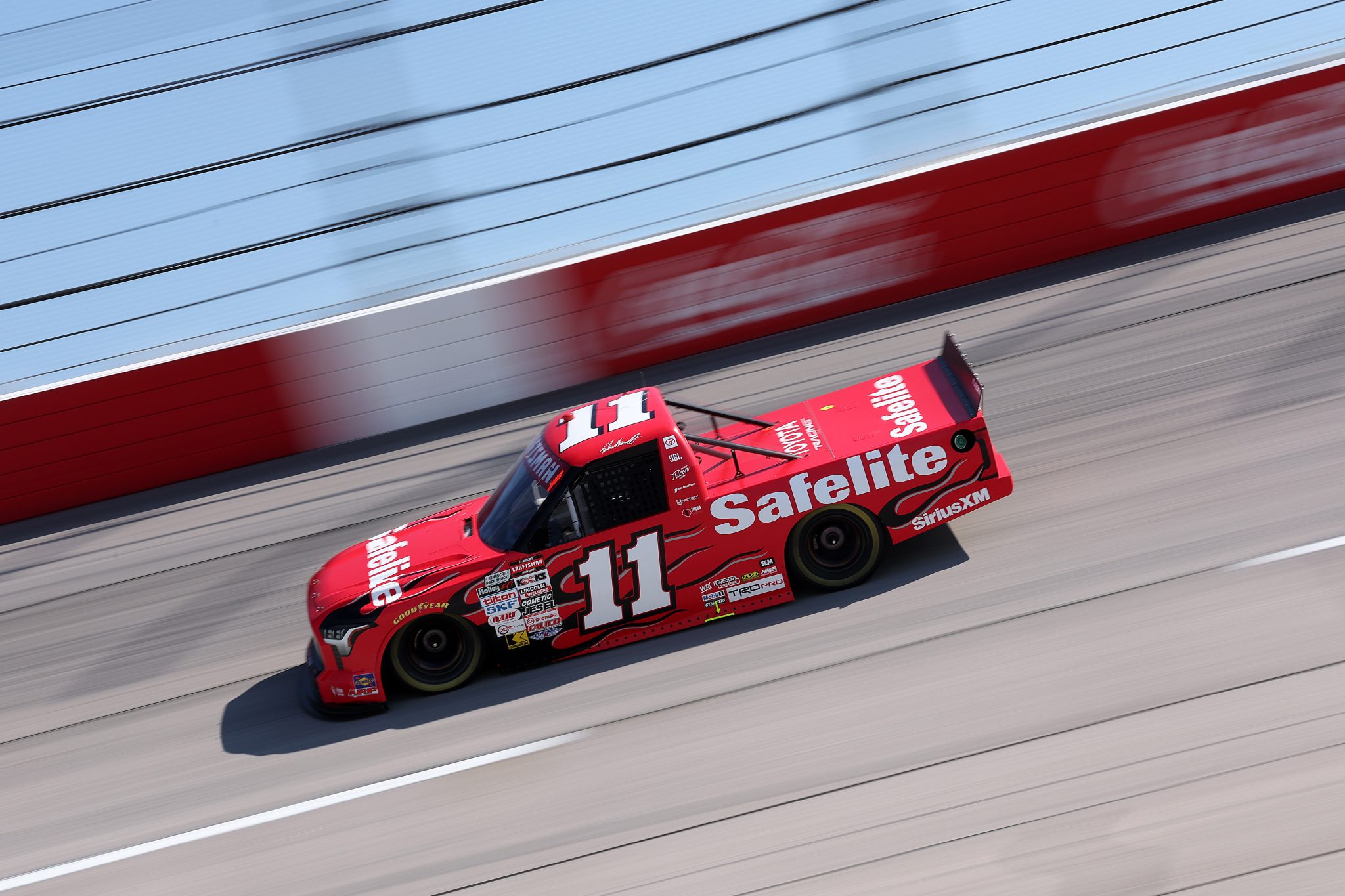 DARLINGTON, SOUTH CAROLINA - MARCH 20: Kaden Honeycutt, driver of the #11 Safelite Toyota, drives during practice for the NASCAR Craftsman Truck Series Buckle Up South Carolina 200 at Darlington Raceway on March 20, 2026 in Darlington, South Carolina. (Photo by David Jensen/Getty Images) | Getty Images