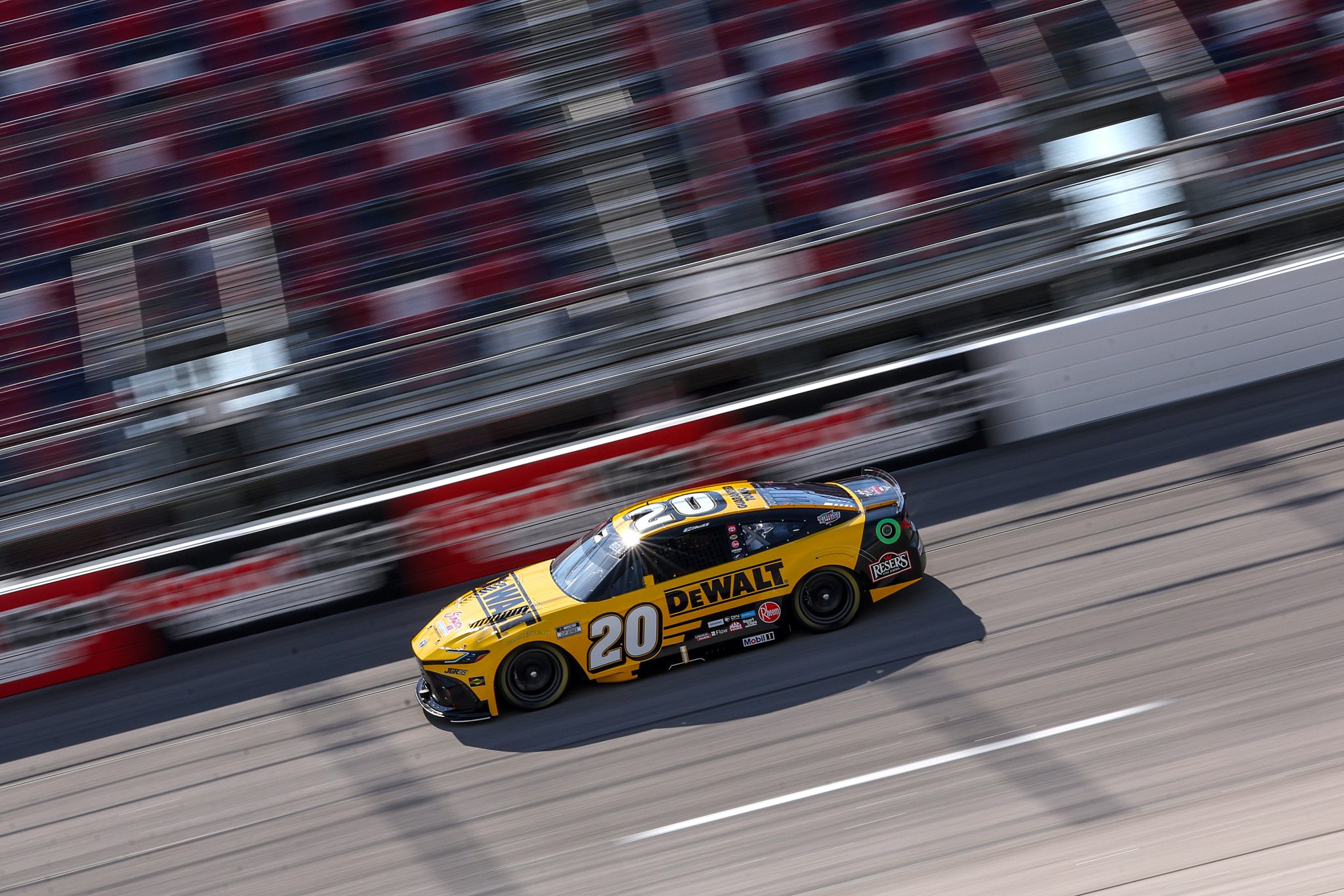 DARLINGTON, SOUTH CAROLINA - MARCH 21: Christopher Bell, driver of the #20 DEWALT Toyota, drives during practice for the NASCAR Cup Series Goodyear 400 at Darlington Raceway on March 21, 2026 in Darlington, South Carolina. (Photo by David Jensen/Getty Images) | Getty Images