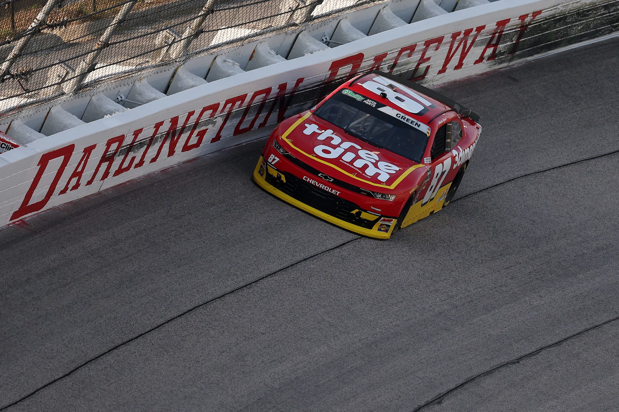 DARLINGTON, SOUTH CAROLINA - MARCH 21: Austin Green, driver of the #87 3Dimensional Services Chevrolet, drives during the NASCAR O'Reilly Auto Parts Series Sport Clips Haircuts VFW Help a Hero 200 at Darlington Raceway on March 21, 2026 in Darlington, South Carolina. (Photo by David Jensen/Getty Images) | Getty Images