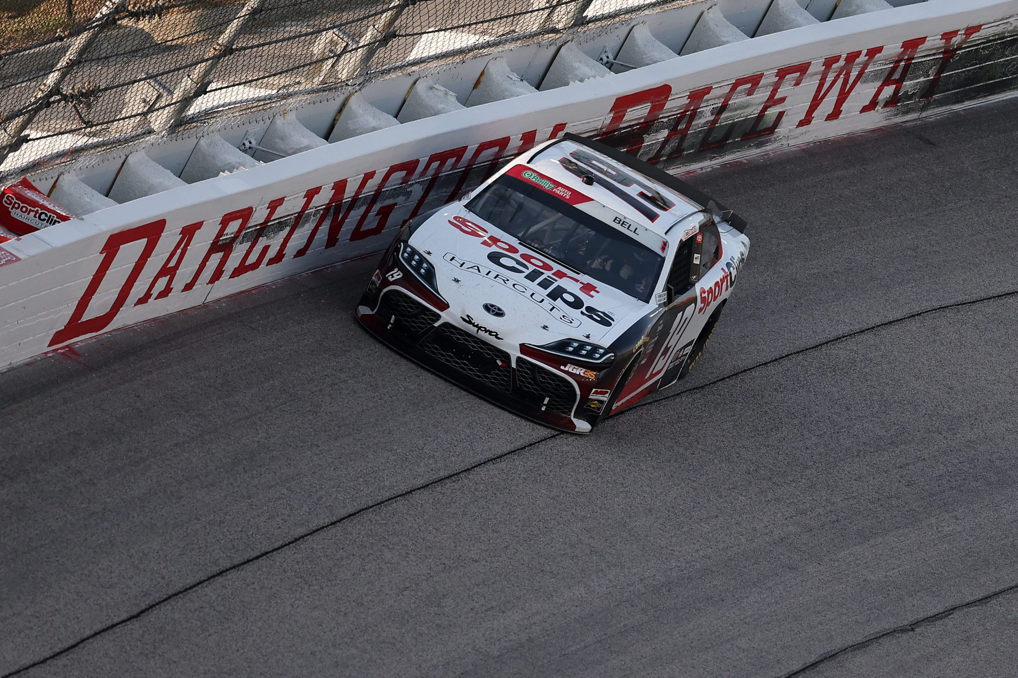DARLINGTON, SOUTH CAROLINA - MARCH 21: Christopher Bell, driver of the #19 Sport Clips Haircuts Toyota, drives during the NASCAR O'Reilly Auto Parts Series Sport Clips Haircuts VFW Help a Hero 200 at Darlington Raceway on March 21, 2026 in Darlington, South Carolina. (Photo by David Jensen/Getty Images) | Getty Images
