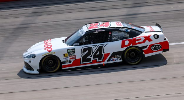 DARLINGTON, SOUTH CAROLINA - MARCH 21: Harrison Burton, driver of the #24 DEX/Sharp Toyota, drives during qualifying for the NASCAR O'Reilly Auto Parts Series Sport Clips Haircuts VFW Help a Hero 200 at Darlington Raceway on March 21, 2026 in Darlington, South Carolina. (Photo by David Jensen/Getty Images) | Getty Images
