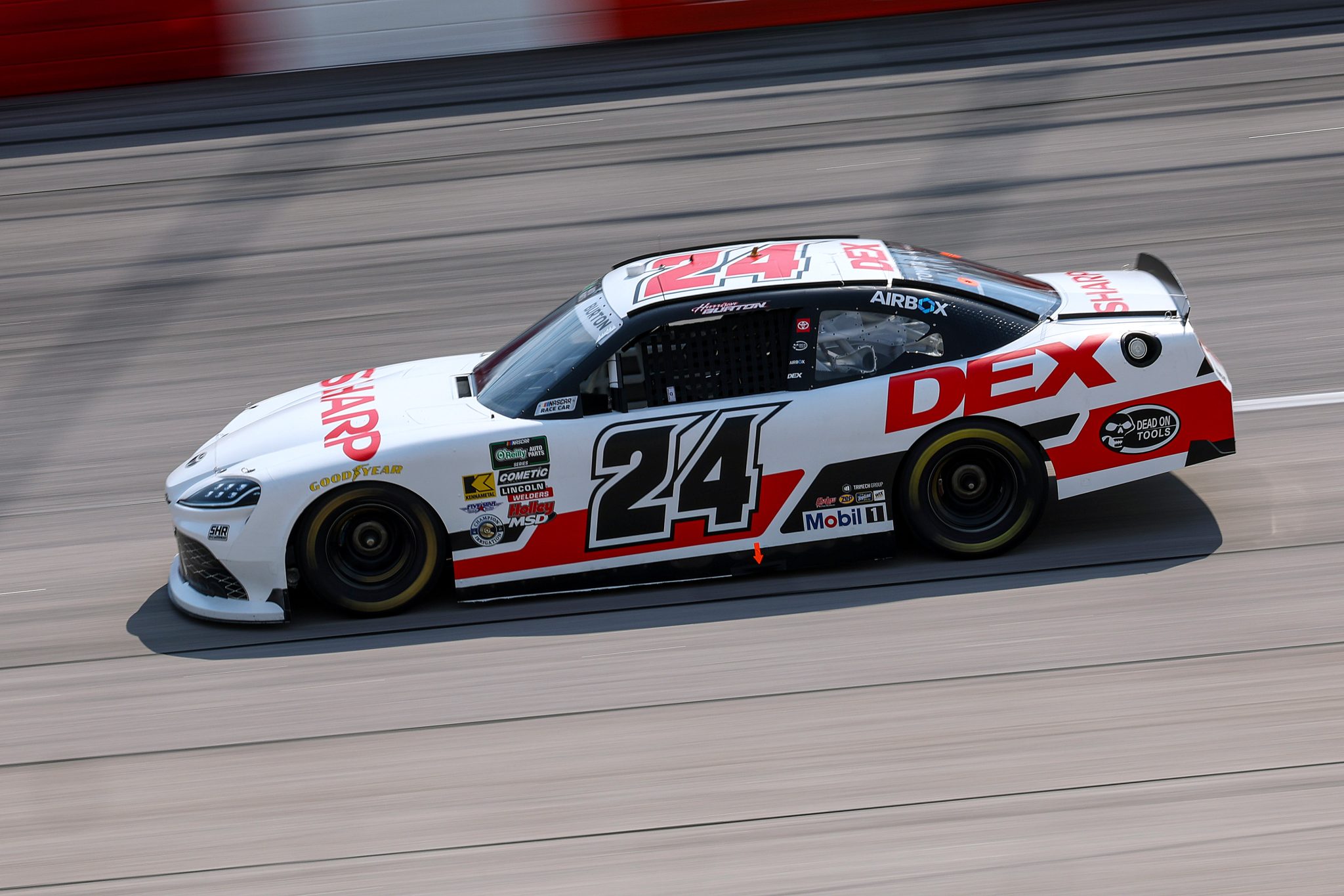 DARLINGTON, SOUTH CAROLINA - MARCH 21: Harrison Burton, driver of the #24 DEX/Sharp Toyota, drives during qualifying for the NASCAR O'Reilly Auto Parts Series Sport Clips Haircuts VFW Help a Hero 200 at Darlington Raceway on March 21, 2026 in Darlington, South Carolina. (Photo by David Jensen/Getty Images) | Getty Images