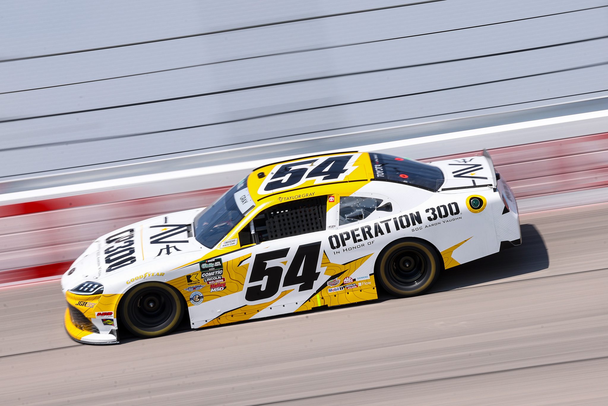 DARLINGTON, SOUTH CAROLINA - MARCH 21: Taylor Gray, driver of the #54 Operation 300 Toyota, drives during practice for the NASCAR O'Reilly Auto Parts Series Sport Clips Haircuts VFW Help a Hero 200 at Darlington Raceway on March 21, 2026 in Darlington, South Carolina. (Photo by David Jensen/Getty Images) | Getty Images