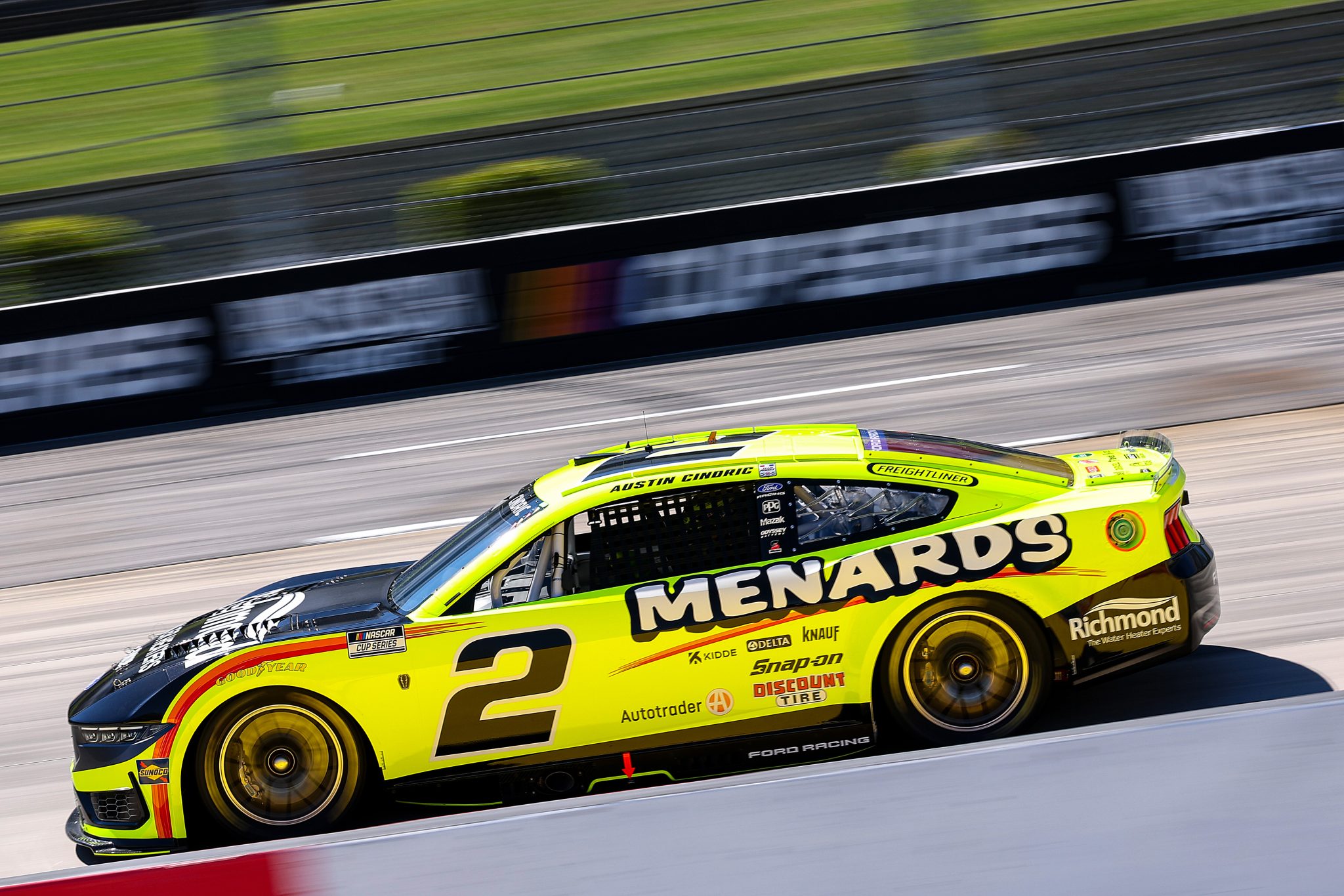 MARTINSVILLE, VIRGINIA - MARCH 28: Austin Cindric, driver of the #2 Menards/Richmond Water Heaters Ford, drives , driver of the #11 Bob's Discount Furniture Toyota, drives during practice for the NASCAR Cup Series Cook Out 400 at Martinsville Speedway on March 28, 2026 in Martinsville, Virginia. (Photo by David Jensen/Getty Images) | Getty Images