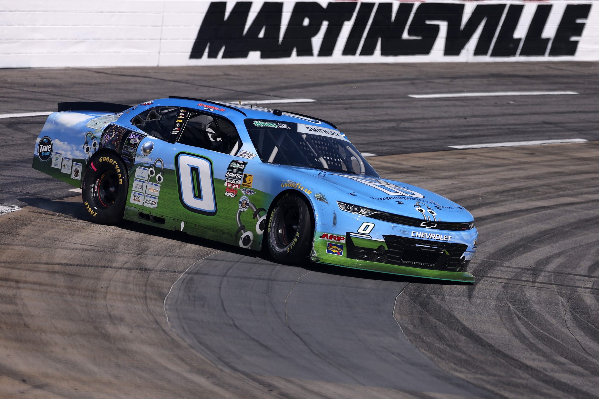 MARTINSVILLE, VIRGINIA - MARCH 28: Garrett Smithley, driver of the #0 West Piedmont YouthBuild Chevrolet, spins after an on-track incident during the NASCAR O'Reilly Auto Parts Series NFPA 250 at Martinsville Speedway on March 28, 2026 in Martinsville, Virginia. (Photo by David Jensen/Getty Images) | Getty Images