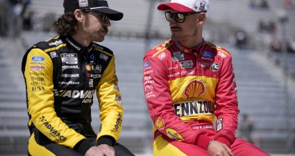 MARTINSVILLE, VIRGINIA - MARCH 28: Ryan Blaney, driver of the #12 Advance Auto Parts Ford, (L) and Joey Logano, driver of the #22 Shell Pennzoil Ford, talk on the grid during practice for the NASCAR Cup Series Cook Out 400 at Martinsville Speedway on March 28, 2026 in Martinsville, Virginia. (Photo by Jacob Kupferman/Getty Images) | Getty Images