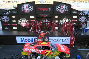 MARTINSVILLE, VIRGINIA - MARCH 28: Justin Allgaier, driver of the #7 BRANDT Chevrolet, celebrates with crew in victory lane after winning the NASCAR O'Reilly Auto Parts Series NFPA 250 at Martinsville Speedway on March 28, 2026 in Martinsville, Virginia. (Photo by Jacob Kupferman/Getty Images) | Getty Images