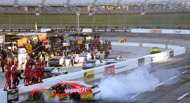 MARTINSVILLE, VIRGINIA - MARCH 28: Justin Allgaier, driver of the #7 BRANDT Chevrolet, celebrates with a burnout after winning  the NASCAR O'Reilly Auto Parts Series NFPA 250 at Martinsville Speedway on March 28, 2026 in Martinsville, Virginia. (Photo by Jacob Kupferman/Getty Images) | Getty Images