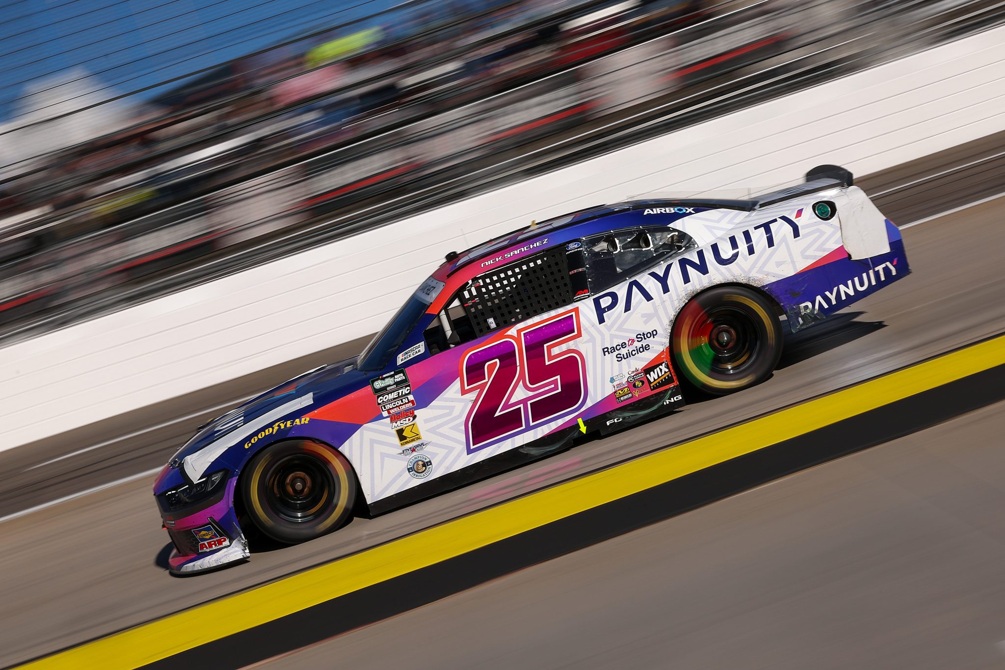 MARTINSVILLE, VIRGINIA - MARCH 28: Nick Sanchez, driver of the #25 Paynuity/Travel Curious Ford, drives during the NASCAR O'Reilly Auto Parts Series NFPA 250 at Martinsville Speedway on March 28, 2026 in Martinsville, Virginia. (Photo by David Jensen/Getty Images) | Getty Images