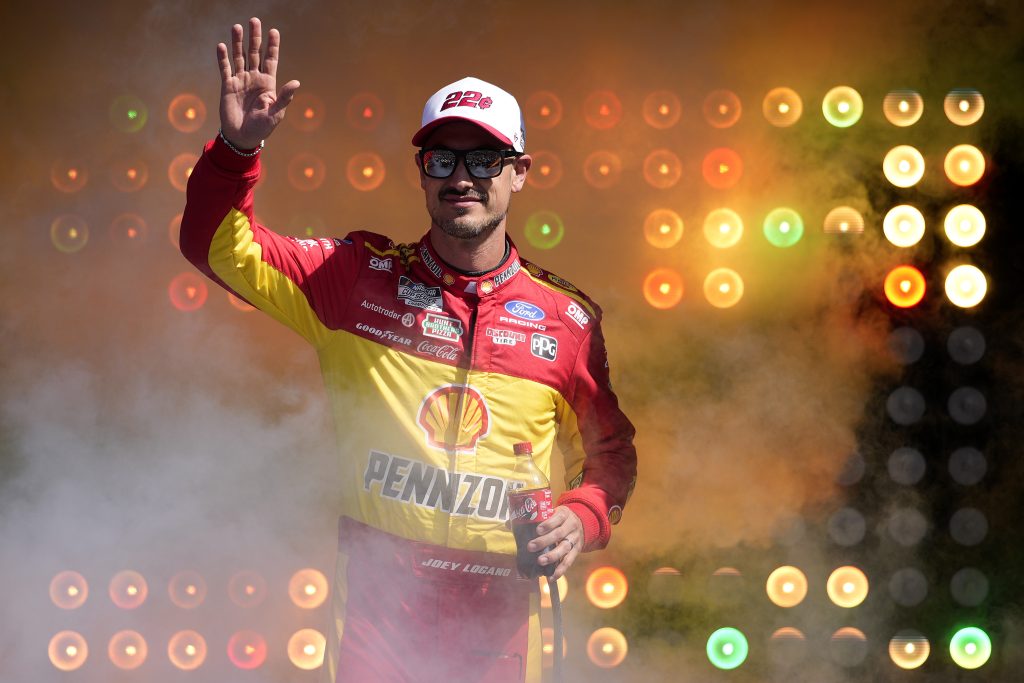 MARTINSVILLE, VIRGINIA - MARCH 29: Joey Logano, driver of the #22 Shell Pennzoil Ford, waves to fans as he walks onstage during driver intros prior to the NASCAR Cup Series Cook Out 400 at Martinsville Speedway on March 29, 2026 in Martinsville, Virginia. (Photo by Jacob Kupferman/Getty Images) | Getty Images