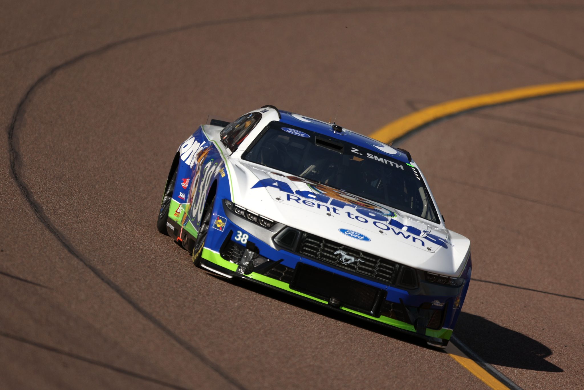 AVONDALE, ARIZONA - MARCH 07: Zane Smith, driver of the #38 Aaron's Rent To Own Ford, drives during practice for the NASCAR Cup Series Straight Talk Wireless 500 at Phoenix Raceway on March 07, 2026 in Avondale, Arizona. (Photo by Meg Oliphant/Getty Images) | Getty Images
