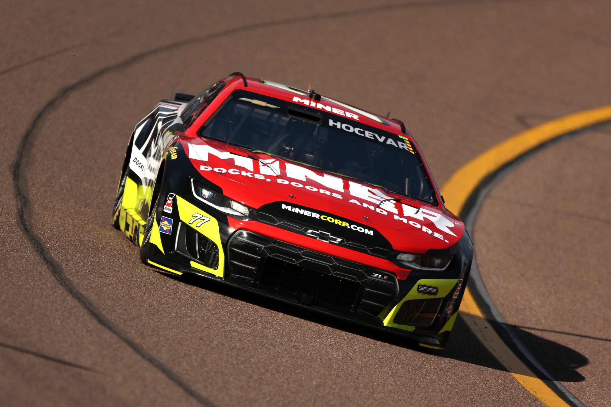 AVONDALE, ARIZONA - MARCH 07: Carson Hocevar, driver of the #77 MINER Docks Doors and More Chevrolet, drives during practice for the NASCAR Cup Series Straight Talk Wireless 500 at Phoenix Raceway on March 07, 2026 in Avondale, Arizona. (Photo by Meg Oliphant/Getty Images) | Getty Images