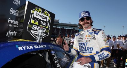 AVONDALE, ARIZONA - MARCH 08: Ryan Blaney, driver of the #12 Dent Wizard Ford, poses with the winner sticker on his car in victory lane after winning the NASCAR Cup Series Straight Talk Wireless 500 at Phoenix Raceway on March 08, 2026 in Avondale, Arizona. (Photo by Meg Oliphant/Getty Images) | Getty Images