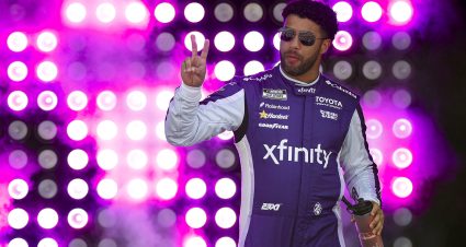 LAS VEGAS, NEVADA - MARCH 15: Bubba Wallace, driver of the #23 Xfinity Toyota, waves to fans as he walks onstage during driver intros prior to the NASCAR Cup Series Pennzoil 400 presented by Jiffy Lube at Las Vegas Motor Speedway on March 15, 2026 in Las Vegas, Nevada. (Photo by Sean Gardner/Getty Images) | Getty Images