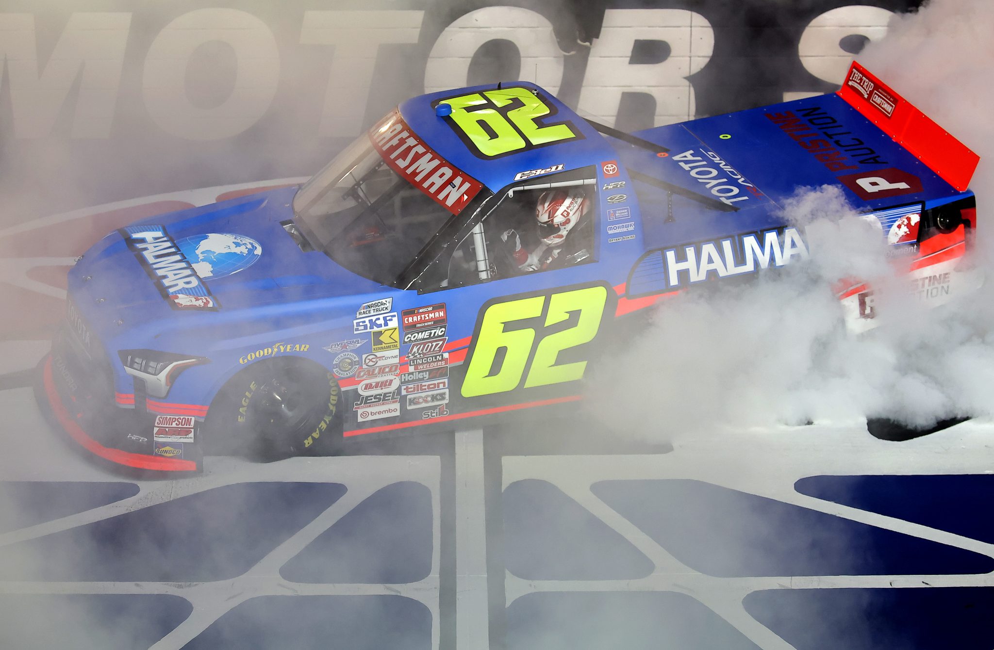 BRISTOL, TENNESSEE - APRIL 10: Christopher Bell, driver of the #62 Halmar Infrastructure Development Toyota, celebrates with a burnout after winning the NASCAR Craftsman Truck Series Tennessee Army National Guard 250 at Bristol Motor Speedway on April 10, 2026 in Bristol, Tennessee. (Photo by Jonathan Bachman/Getty Images) | Getty Images