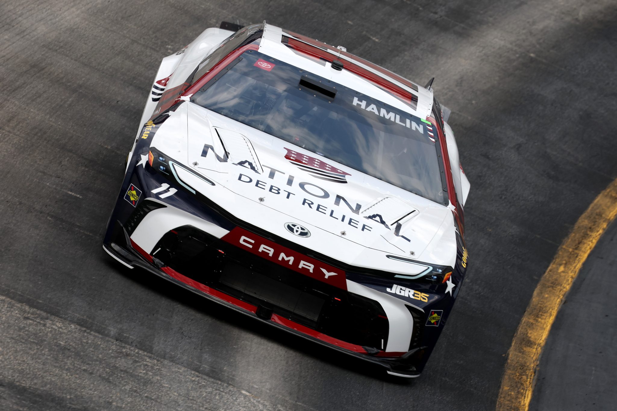 BRISTOL, TENNESSEE - APRIL 11: Denny Hamlin, driver of the #11 National Debt Relief Toyota, drives during practice for the NASCAR Cup Series Food City 500 at Bristol Motor Speedway on April 11, 2026 in Bristol, Tennessee. (Photo by Chris Graythen/Getty Images) | Getty Images