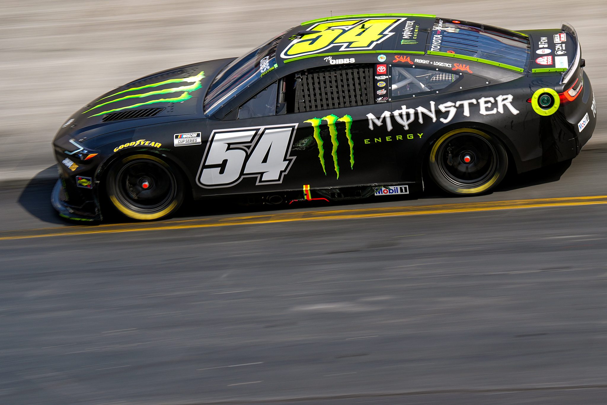 BRISTOL, TENNESSEE - APRIL 12: Ty Gibbs, driver of the #54 Monster Energy Toyota, drives during the NASCAR Cup Series Food City 500 at Bristol Motor Speedway on April 12, 2026 in Bristol, Tennessee. (Photo by Matt Kelley/Getty Images) | Getty Images