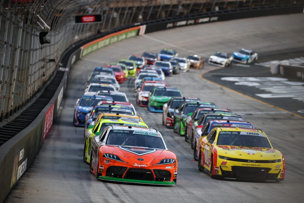 BRISTOL, TENNESSEE - APRIL 11: William Sawalich, driver of the #18 SoundGear Toyota, and Sheldon Creed, driver of the #00 Ollie's Chevrolet, race during the NASCAR O'Reilly Auto Parts Series Suburban Propane 300 at Bristol Motor Speedway on April 11, 2026 in Bristol, Tennessee. (Photo by Chris Graythen/Getty Images) | Getty Images