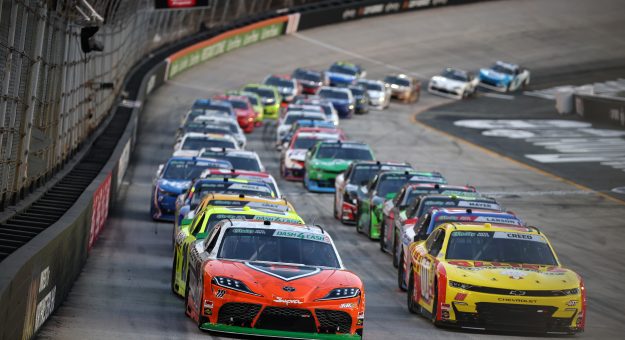 BRISTOL, TENNESSEE - APRIL 11: William Sawalich, driver of the #18 SoundGear Toyota, and Sheldon Creed, driver of the #00 Ollie's Chevrolet, race during the NASCAR O'Reilly Auto Parts Series Suburban Propane 300 at Bristol Motor Speedway on April 11, 2026 in Bristol, Tennessee. (Photo by Chris Graythen/Getty Images) | Getty Images