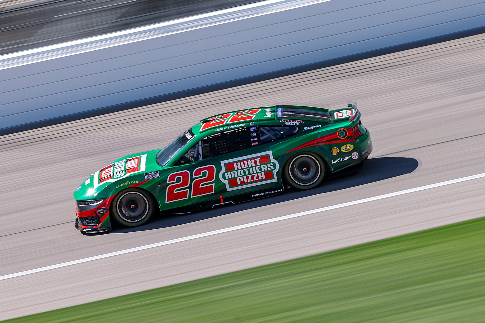 KANSAS CITY, KANSAS - APRIL 18: Joey Logano, driver of the #22 Hunt Brothers Pizza Ford, drives during practice for the NASCAR Cup Series AdventHealth 400 at Kansas Speedway on April 18, 2026 in Kansas City, Kansas. (Photo by David Jensen/Getty Images) | Getty Images