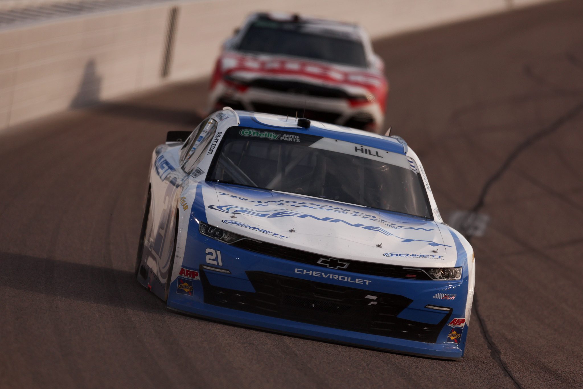 KANSAS CITY, KANSAS - APRIL 18: Austin Hill, driver of the #21 Bennett Transportation Chevrolet, drives during the NASCAR O'Reilly Auto Parts Series Kansas Lottery 300 at Kansas Speedway on April 18, 2026 in Kansas City, Kansas. (Photo by David Jensen/Getty Images) | Getty Images