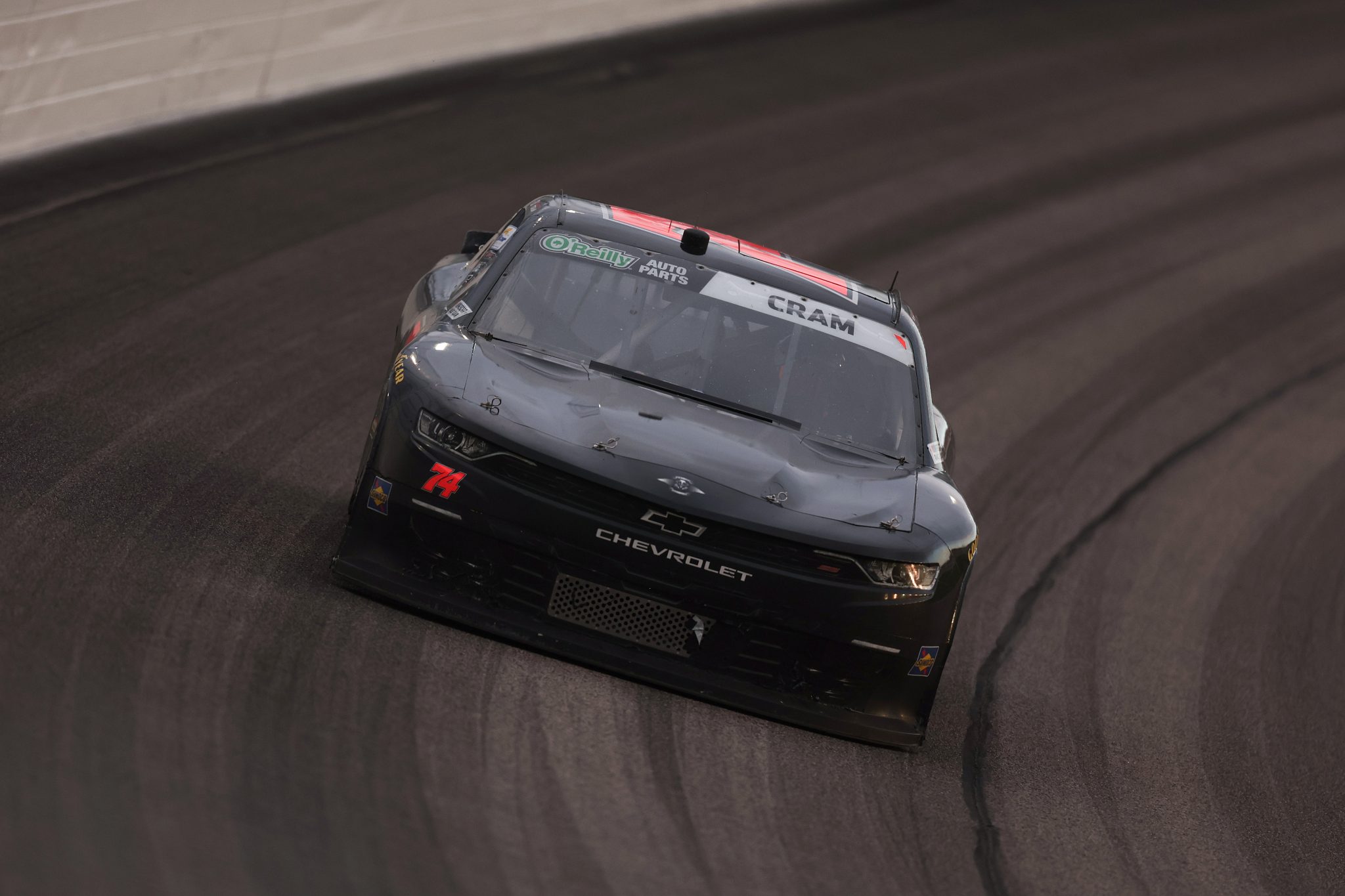 KANSAS CITY, KANSAS - APRIL 18: Dawson Cram, driver of the #74 Chevrolet, drives during the NASCAR O'Reilly Auto Parts Series Kansas Lottery 300 at Kansas Speedway on April 18, 2026 in Kansas City, Kansas. (Photo by David Jensen/Getty Images) | Getty Images