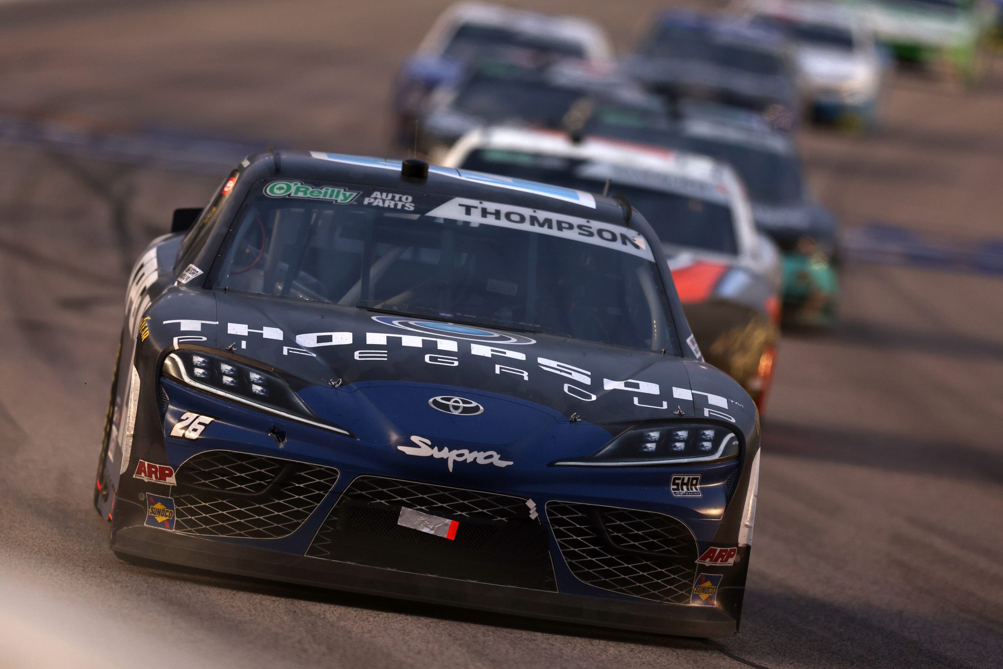 KANSAS CITY, KANSAS - APRIL 18: Dean Thompson, driver of the #26 Thompson Pipe Group Toyota, drives during the NASCAR O'Reilly Auto Parts Series Kansas Lottery 300 at Kansas Speedway on April 18, 2026 in Kansas City, Kansas. (Photo by David Jensen/Getty Images) | Getty Images
