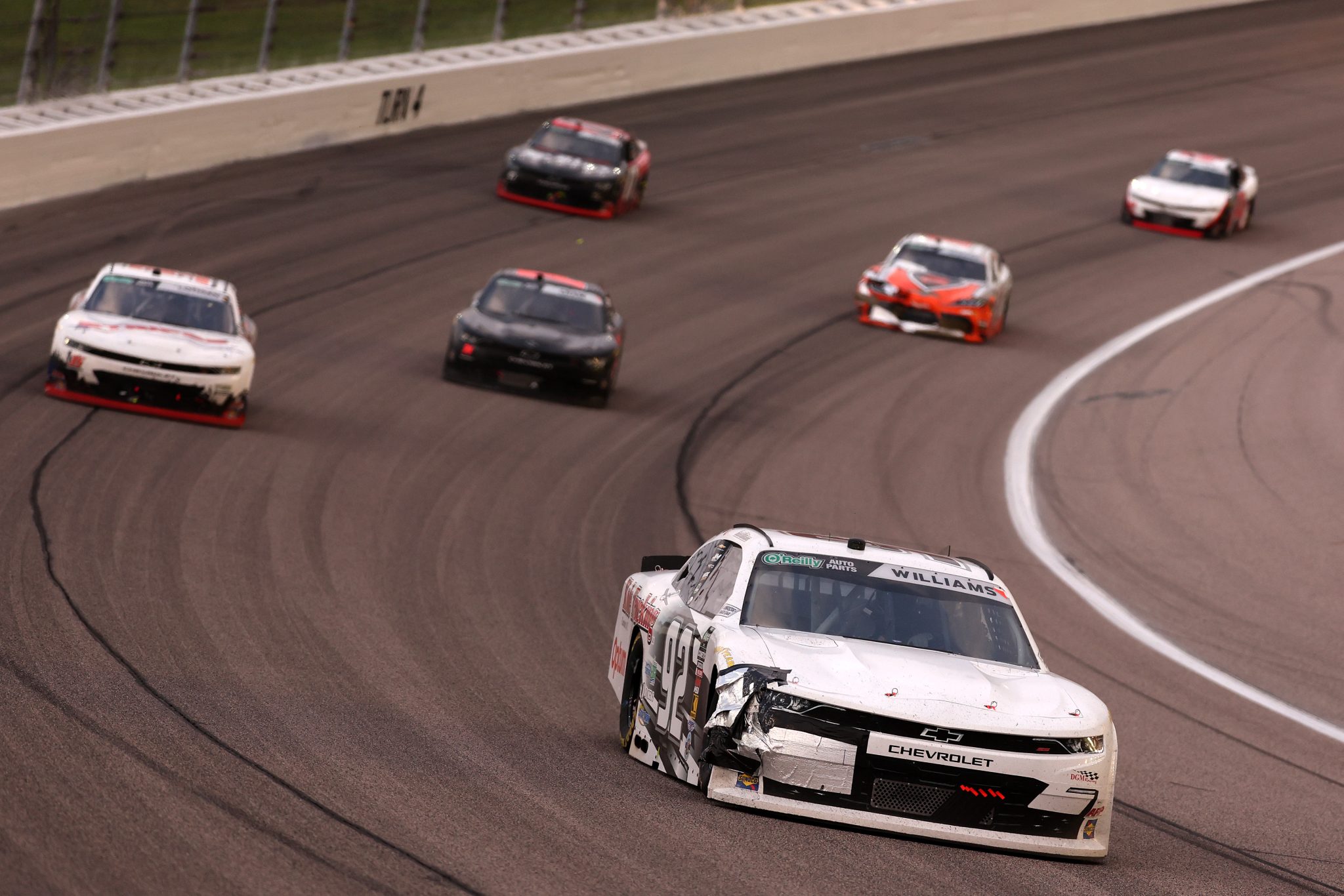 KANSAS CITY, KANSAS - APRIL 18: Josh Williams, driver of the #92 Optum Chevrolet, drives a damaged car during the NASCAR O'Reilly Auto Parts Series Kansas Lottery 300 at Kansas Speedway on April 18, 2026 in Kansas City, Kansas. (Photo by David Jensen/Getty Images) | Getty Images